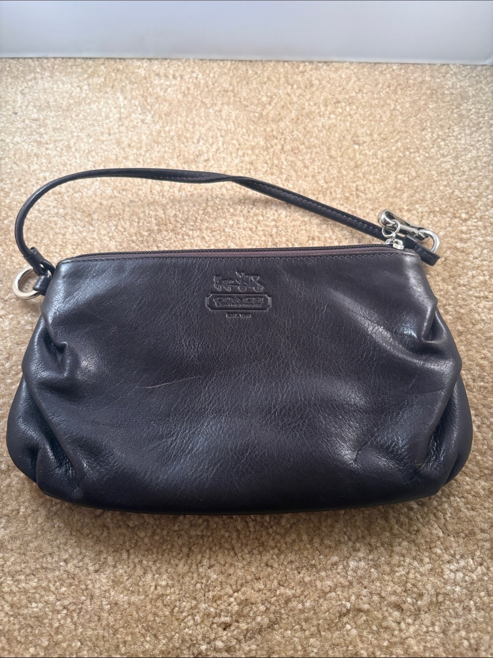Coach mahogany
 Leather Wristlet Bag
